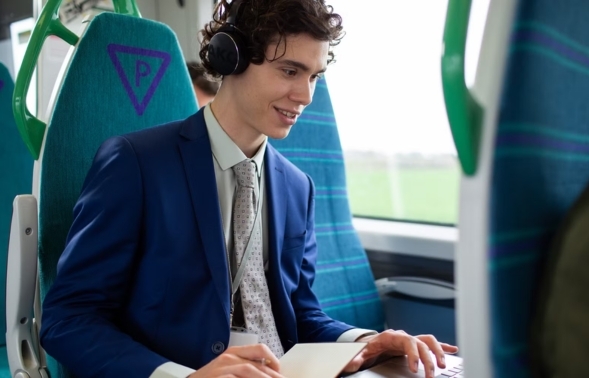 Squeaky seat-back train tables given the silent treatment